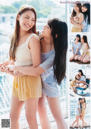 A couple of women standing next to each other on top of a roof.