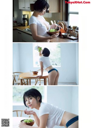 A naked asian woman leaning against a wall.